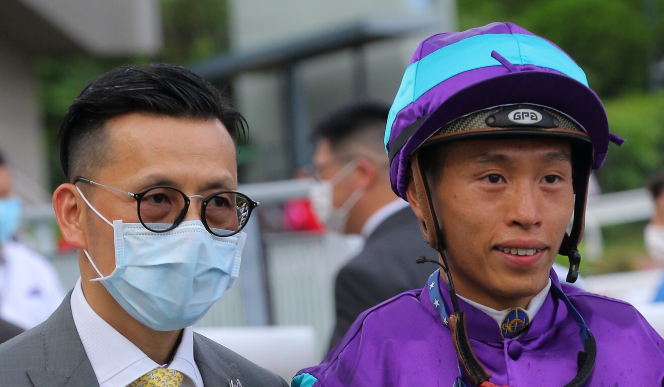 Trainer Frankie Lor and jockey Vincent Ho celebrate Winning Dreamer’s victory.