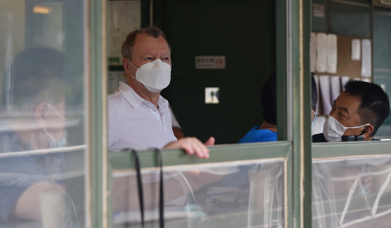 Jockey Club chief executive Winfried Engelbrecht-Bresges talks to trainers at trackwork last week.