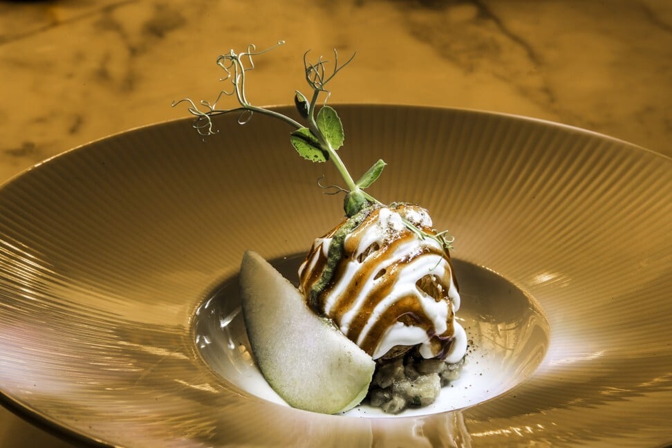 Potato sphere chaat with white pea mash from Indian Accent.