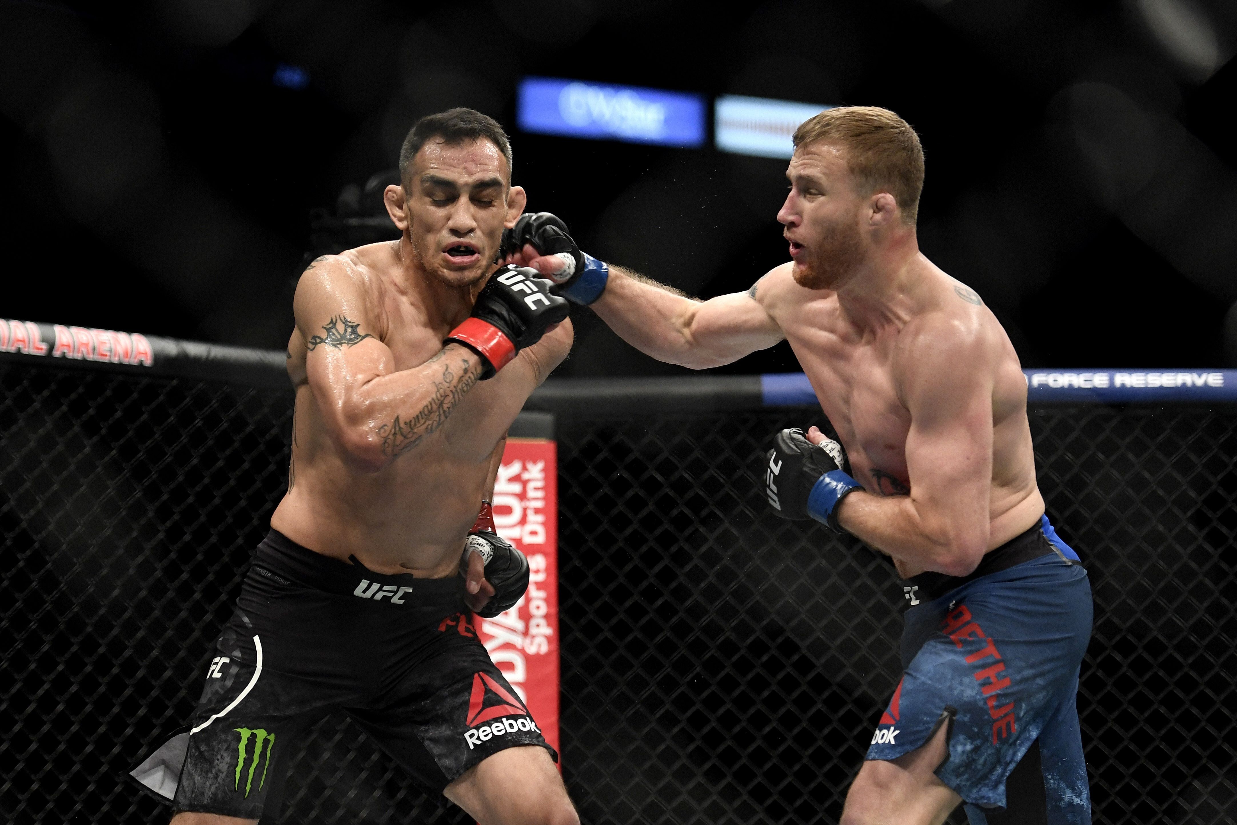 Justin Gaethje punches Tony Ferguson in their UFC interim lightweight title fight at UFC 249 in the VyStar Veterans Memorial Arena in Jacksonville, Florida in May. Photo: AFP