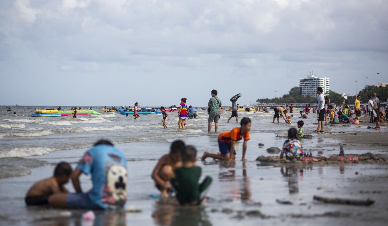Domestic visitors relax on a beach in Chonburi, Thailand, on June 14. Photo: Bloomberg