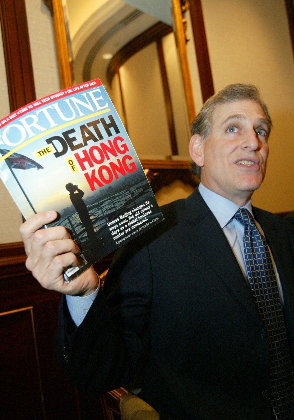 Then American Chamber of Commerce chairman Steve Marcopoto holds up a copy of the July 1997 Fortune magazine edition with the cover “The Death of Hong Kong” during a lunch in Pacific Place on January 18, 2006. By then, many of the worst predictions for Hong Kong had failed to materialise. Photo: David Wong