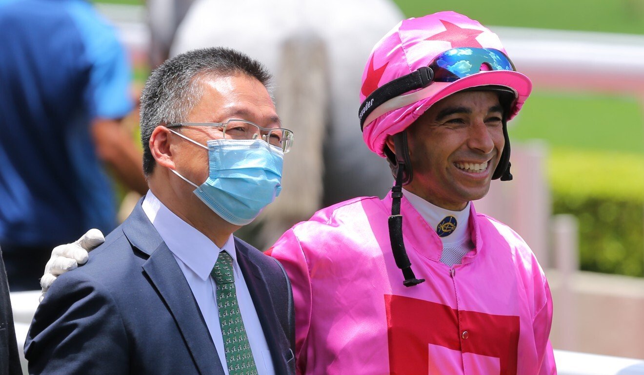 Trainer Francis Lui and jockey Joao Moreira celebrate Chancheng Prince’s victory.