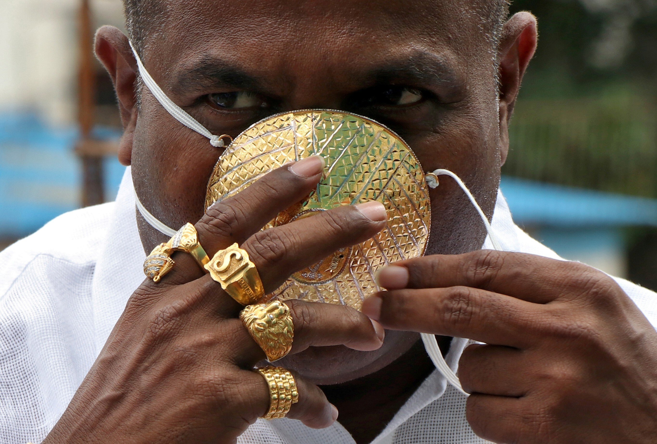 Coronavirus bling bling: Indian businessman wears US$4,000 custom gold mask  for protection | South China Morning Post