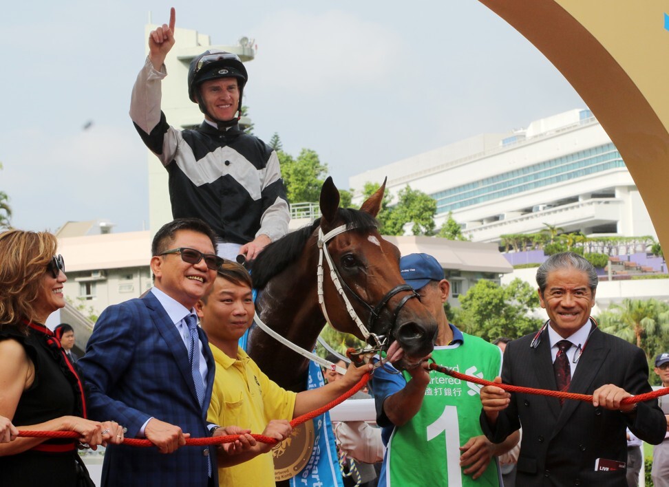 Wong Leung (left) and the rest of the Exultant team celebrate his win in the 2019 Champions & Chater Cup.