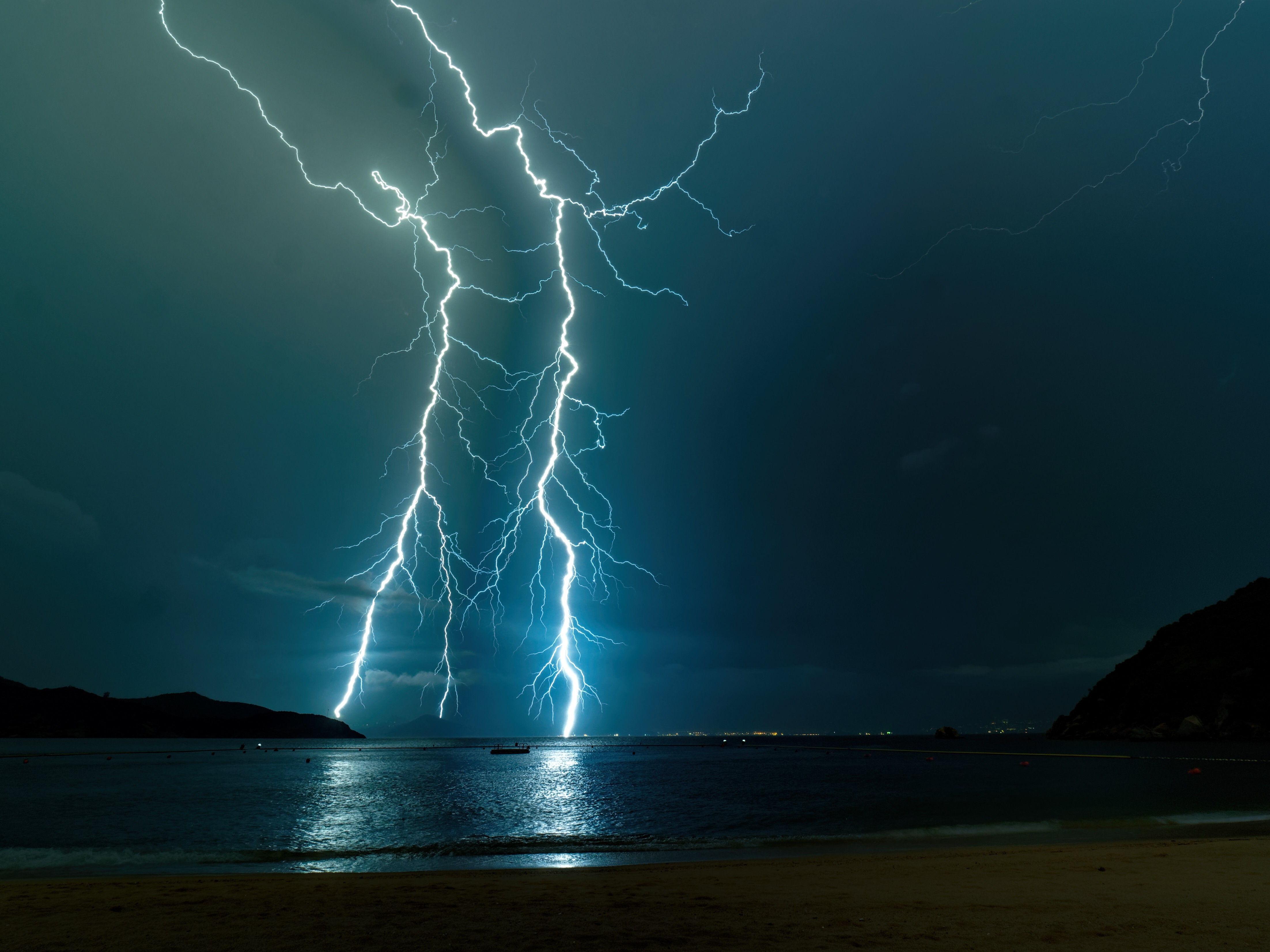 Stunning lightning bolts flash above Cheung Chau in Hong Kong. There are a few useful tips to remember when taking photographs in different types of weather. Photo: Martin Williams