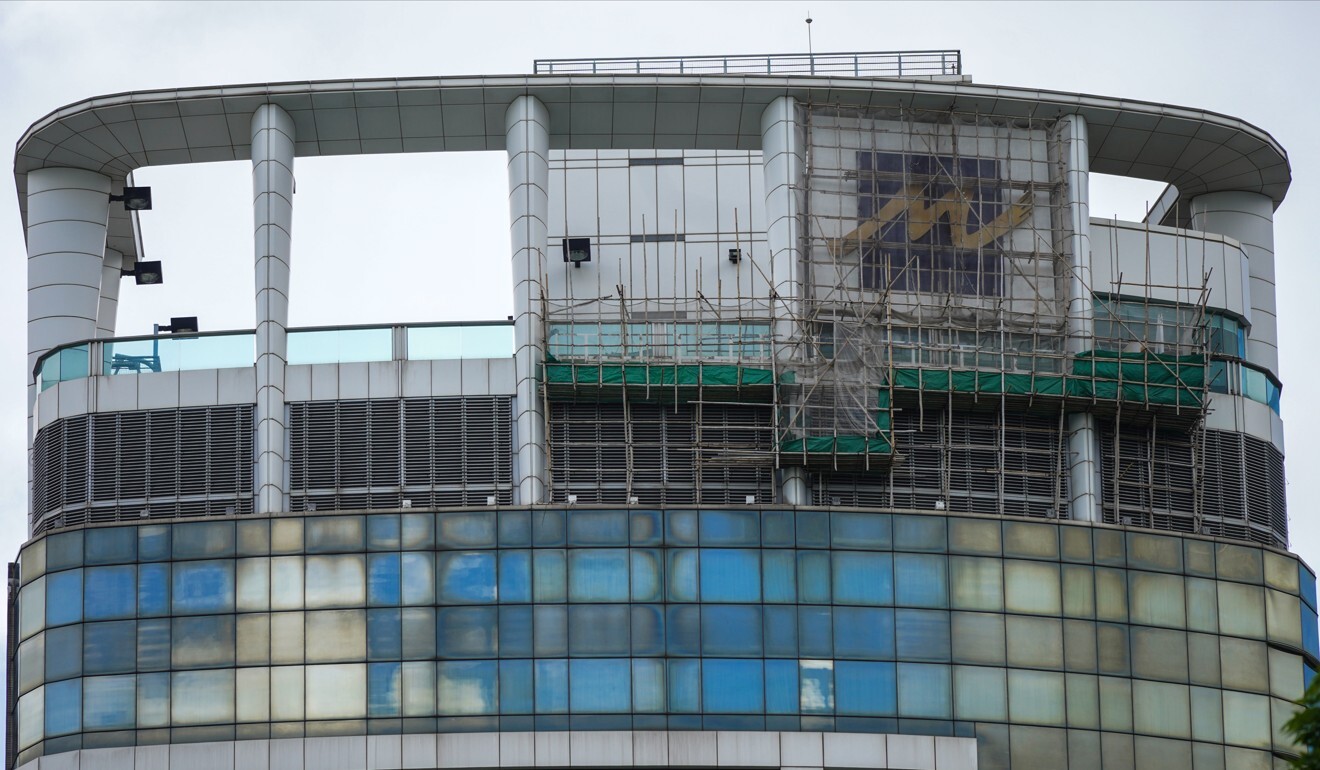 The logo for the Metropark Hotel was already obscured on Tuesday as work to transform it into Beijing’s new Office for Safeguarding National Security was under way. Photo: Sam Tsang