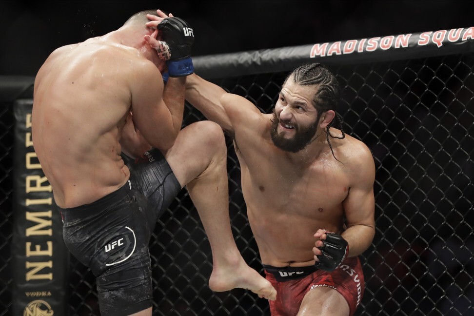 Jorge Masvidal punches Nate Diaz on his way to winning the ‘BMF’ belt at UFC 244. Photo: AP