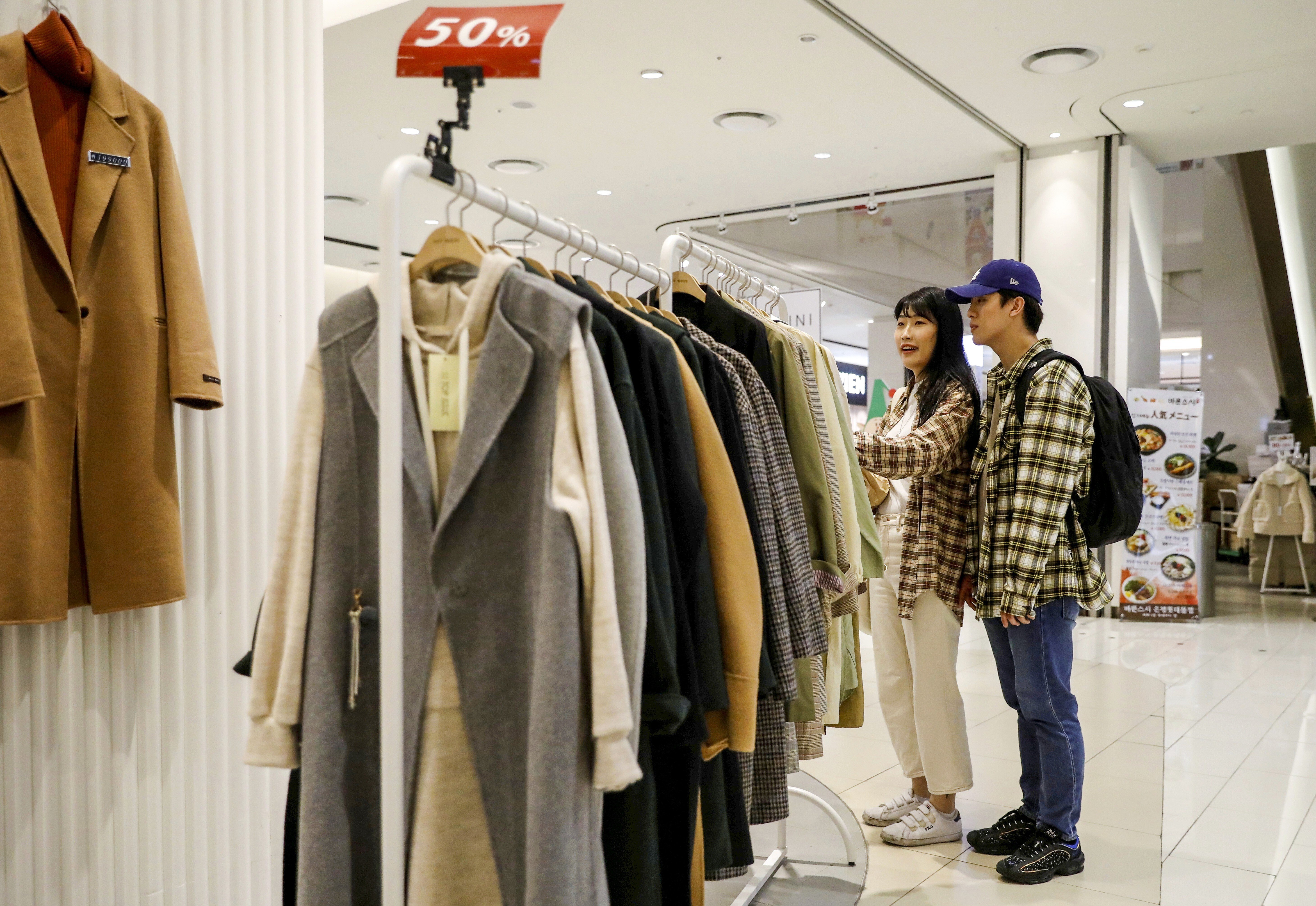 Why are Koreans rushing to buy expensive luxury goods from Louis Vuitton,  Chanel and Dior – while ignoring discounts at local fashion brands?