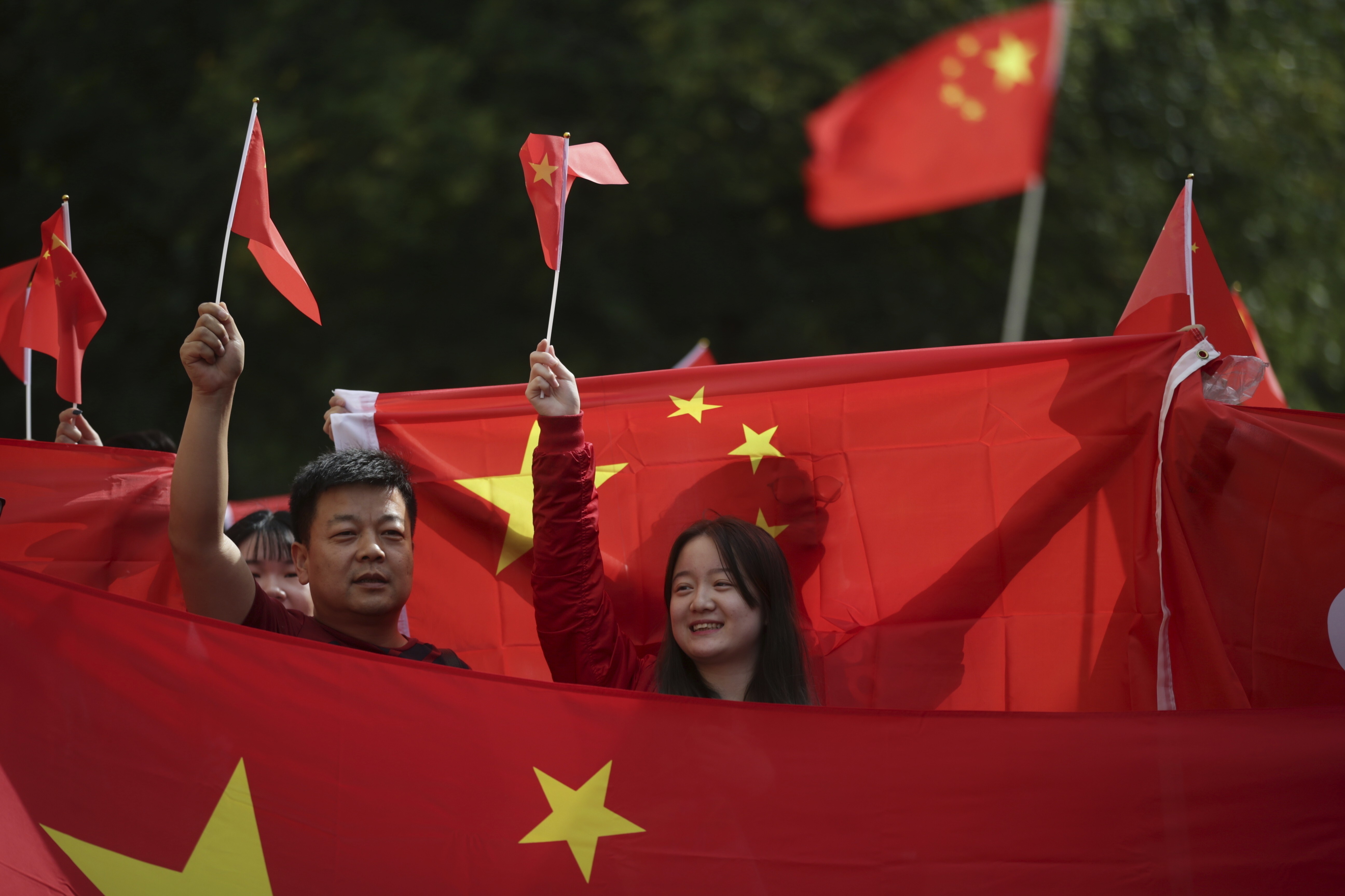 Pro-China Chinese Canadians show their support for Hong Kong’s extradition bill, in the midst of an anti-extradition rally in Vancouver, Canada, on August 17 last year. Photo: The Canadian Press via AP