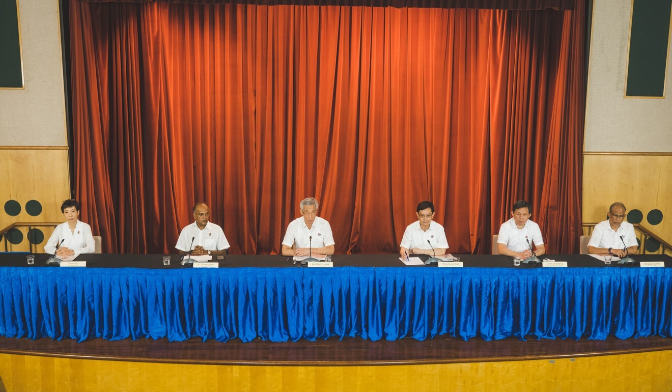 Singapore Prime Minister Lee Hsien Loong (third from left) holds a press conference on Saturday after the 2020 general election. He is flanked by ministers Grace Fu, K. Shanmugam, Heng Swee Keat, Chan Chun Sing and Masagos Zulkifli. Photo: People’s Action Party
