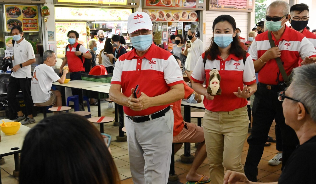 PSP chief Tan Cheng Bock greets residents on the campaign trail on July 2, 2020. Photo: AFP