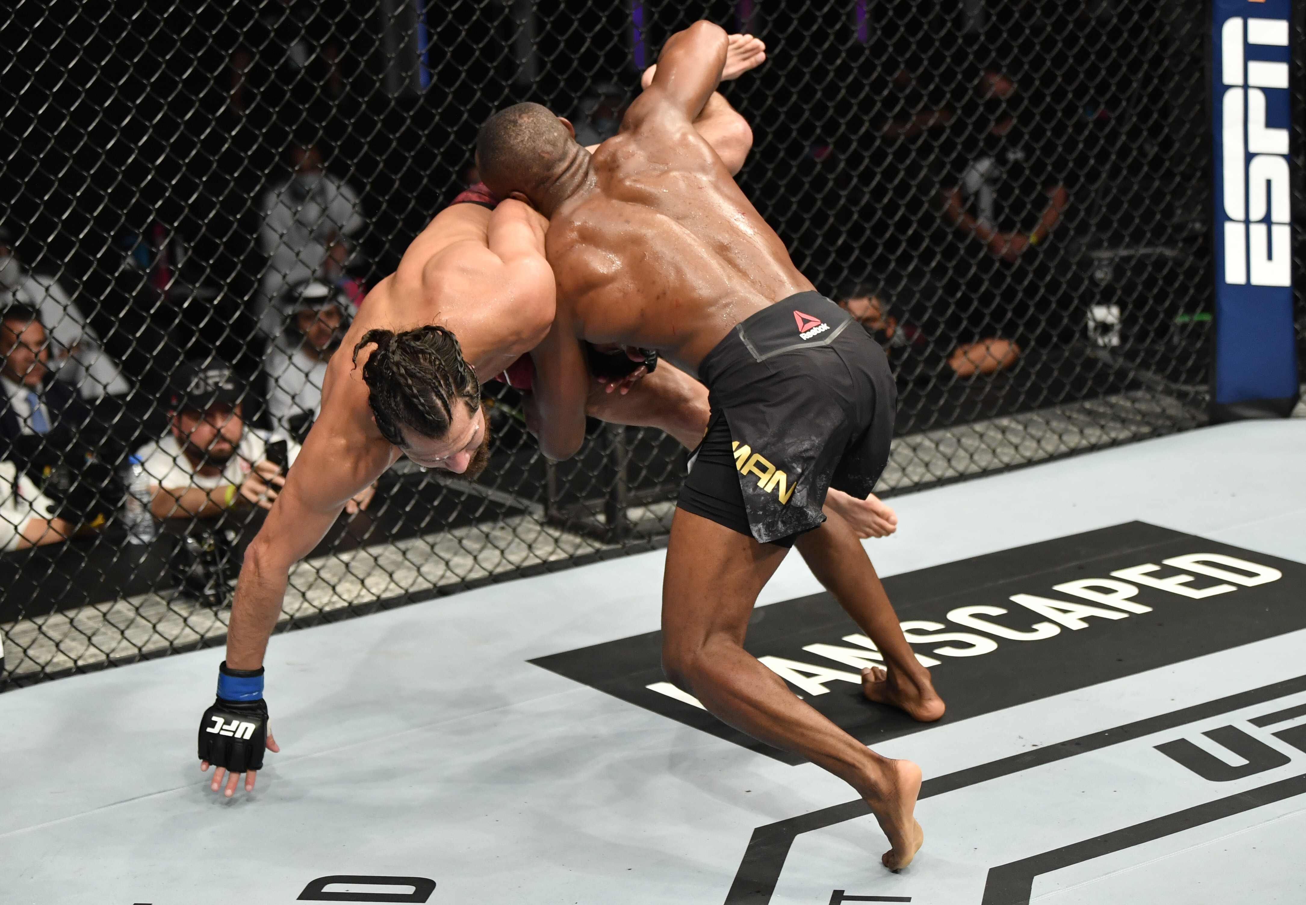 Kamaru Usman takes down Jorge Masvidal in their UFC welterweight championship fight during UFC 251. Photo: Jeff Bottari/Zuffa LLC