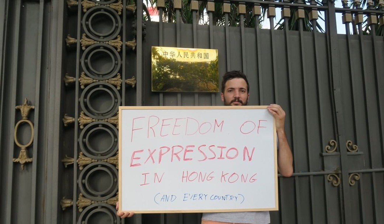 Adrià Ballester protests in front of the consulate general of China in Barcelona. Photo: Handout