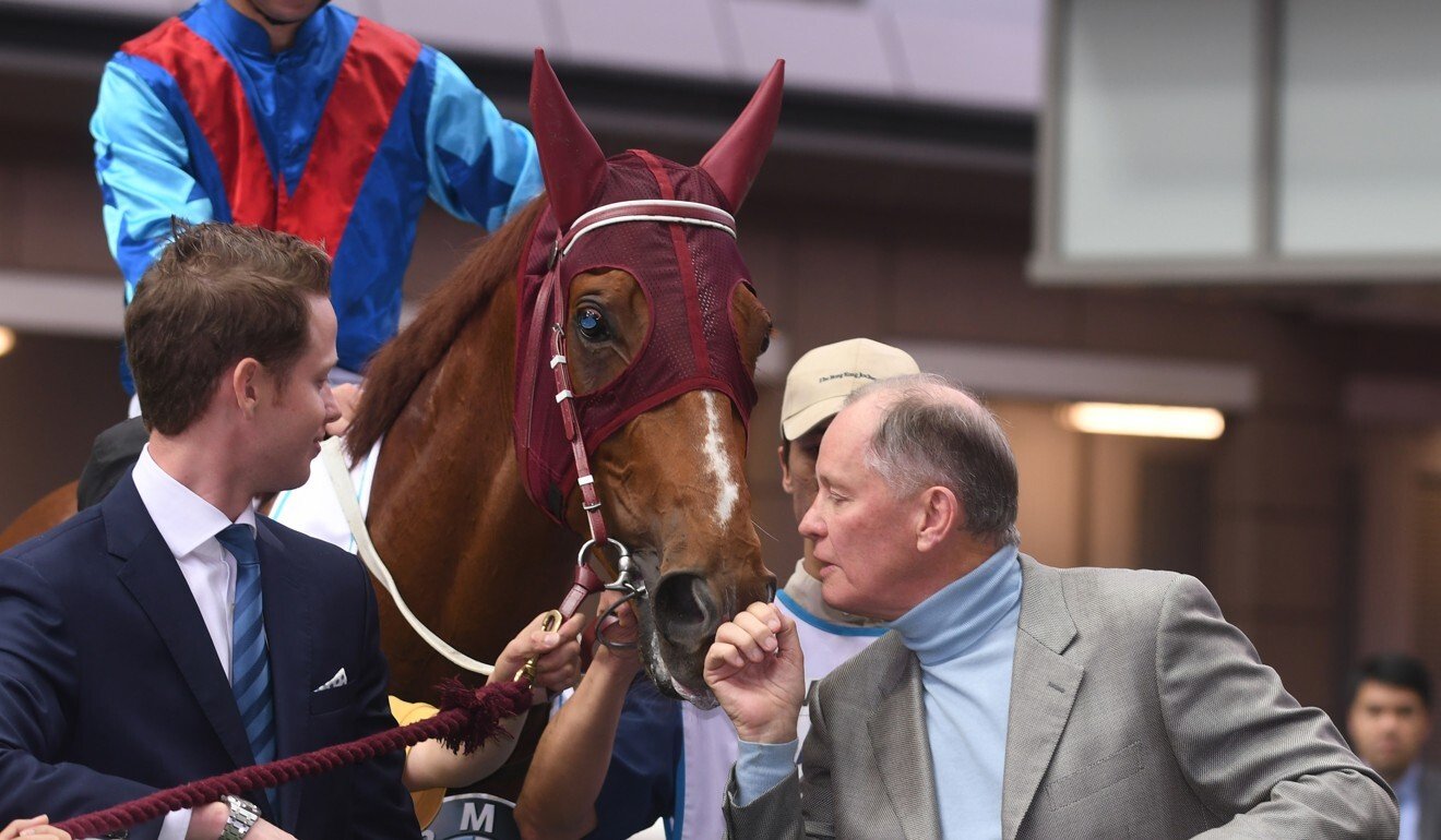 John Moore gives Rapper Dragon a kiss after winning the 2017 Hong Kong Derby. Photo: Kenneth Chan