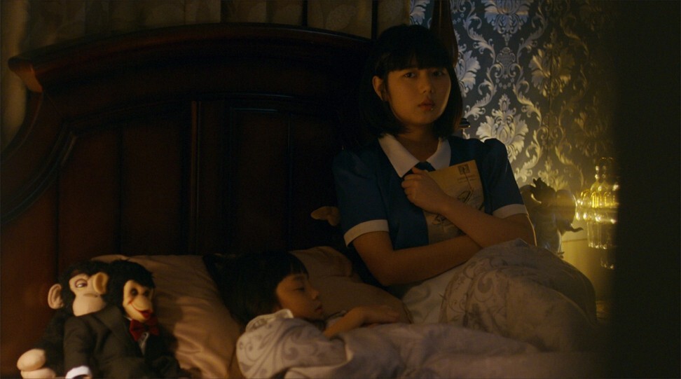 Keetapat Pongrue (left) and Sornarin in a still from The Maid. Photo: Netflix.