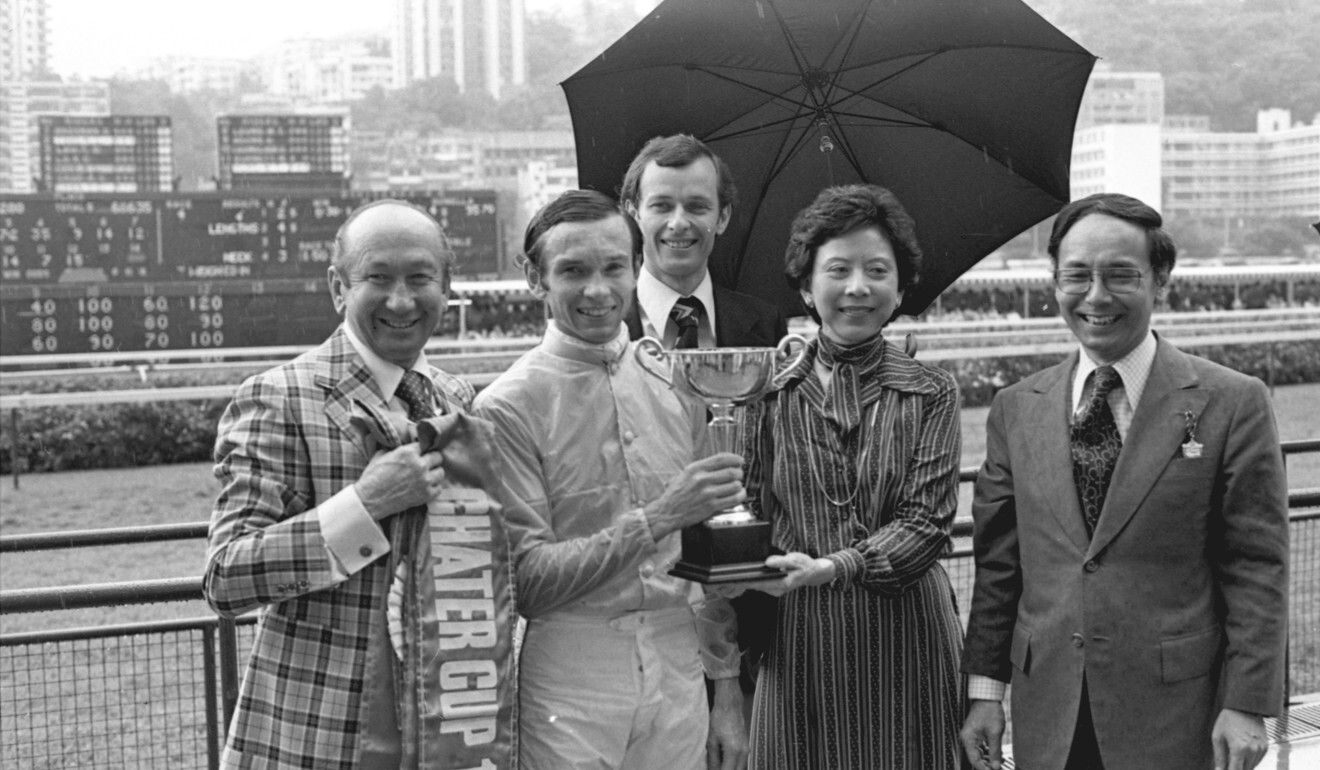 Members of the Moore family: horse trainer George Moore (left), jockey Gary Moore (second left) and assistant trainer John Moore (back) posing with Silver Lining's owners Mr and Mrs Sanford Yung Yung-tao after the horse won the 1979 Hong Kong Champions & Chater Cup at the Happy Valley Racecourse. Photo: SCMP