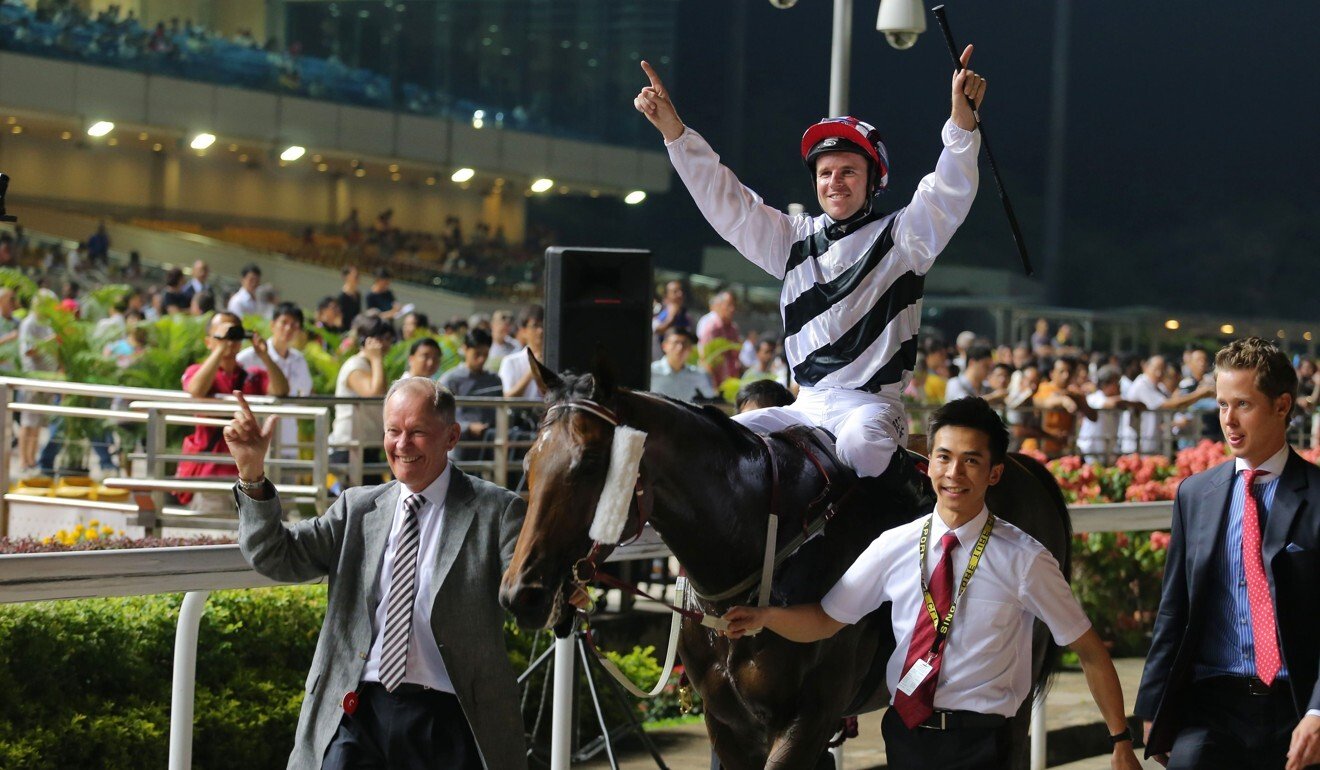 Dan Excel, ridden by Tommy Berry, won the Singapore Airlines International Cup (International Group 1, 2000m). John Moore leads in Dan Excel after winning the Singapore Airlines International Cup in 2015. Photo: Kenneth Chan