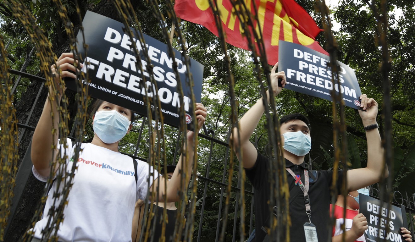 Supporters of ABS-CBN protest outside the House of Representatives in Manila, Philippines. Photo: AP
