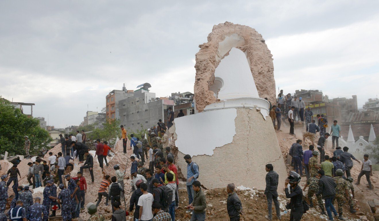 Nepalese rescuers at the collapsed Dharahara Tower in Kathmandu on April 25, 2015, after a massive earthquake. Photo: AFP