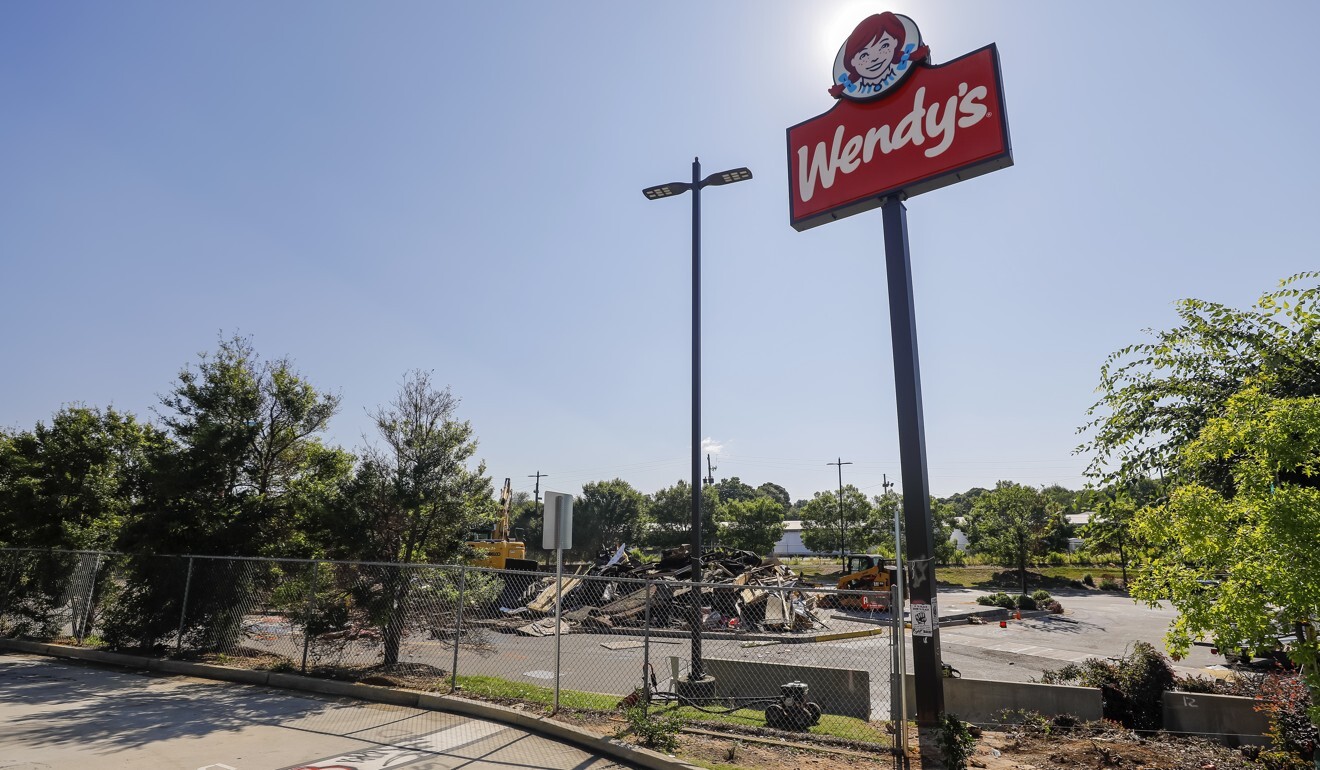 A private demolition crew tears down the now infamous burned-out Wendy's restaurant in Atlanta, Georgia, where Rayshard Brooks was killed on June 12. Photo: EPA-EFE