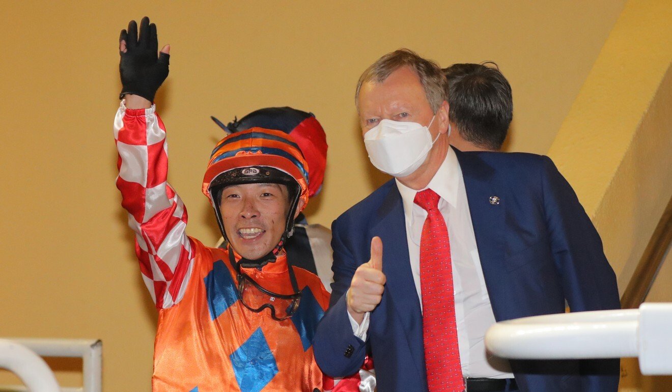 Jockey Ben So and Winfried Engelbrecht-Bresges at Happy Valley on Wednesday night.