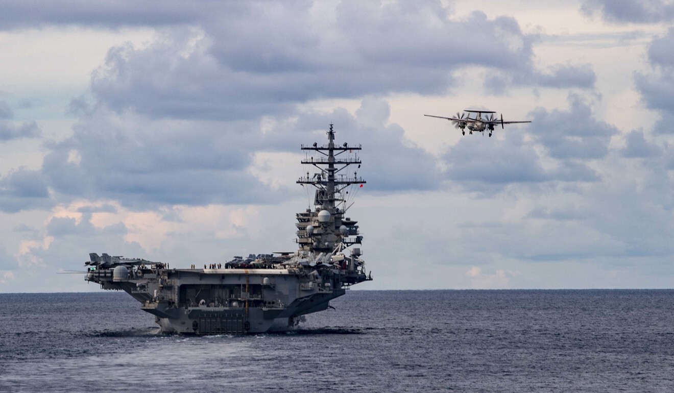 The aircraft carrier USS Ronald Regan conducts a drill in the South China Sea on July 6. Photo: EPA