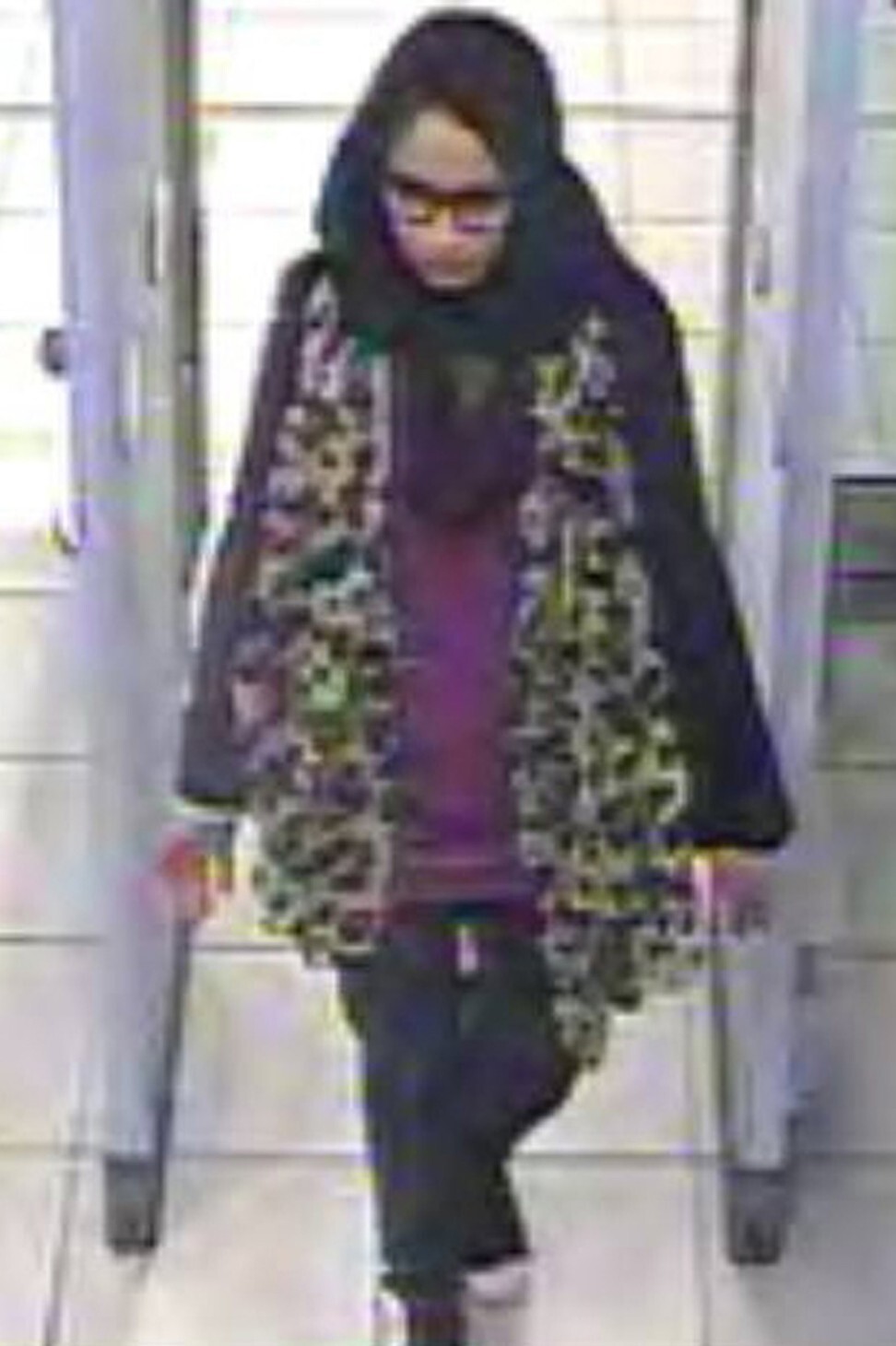 A video grab from CCTV footage shows Shamima Begum passing through security barriers at Gatwick Airport in February 2015. Photo: Metropolitan Police handout via AFP