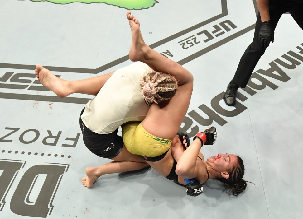 Amanda Ribas secures an armbar submission against Paige VanZant in their flyweight fight during UFC 251. Photo: Jeff Bottari/Zuffa LLC via USA TODAY Sports