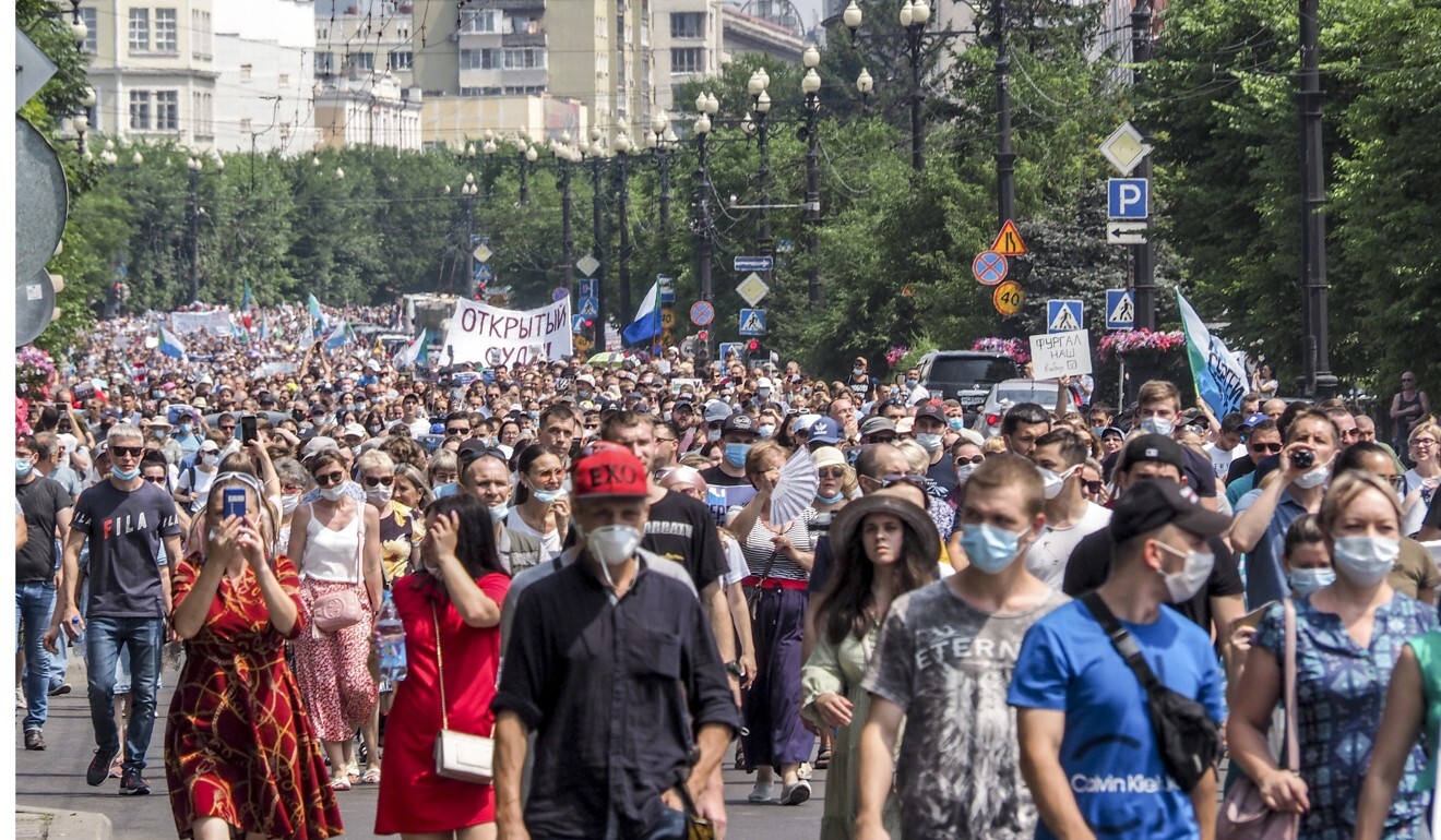 People march during a protest in support of Sergei Furgal, the governor of the Khabarovsk region. Photo: AP