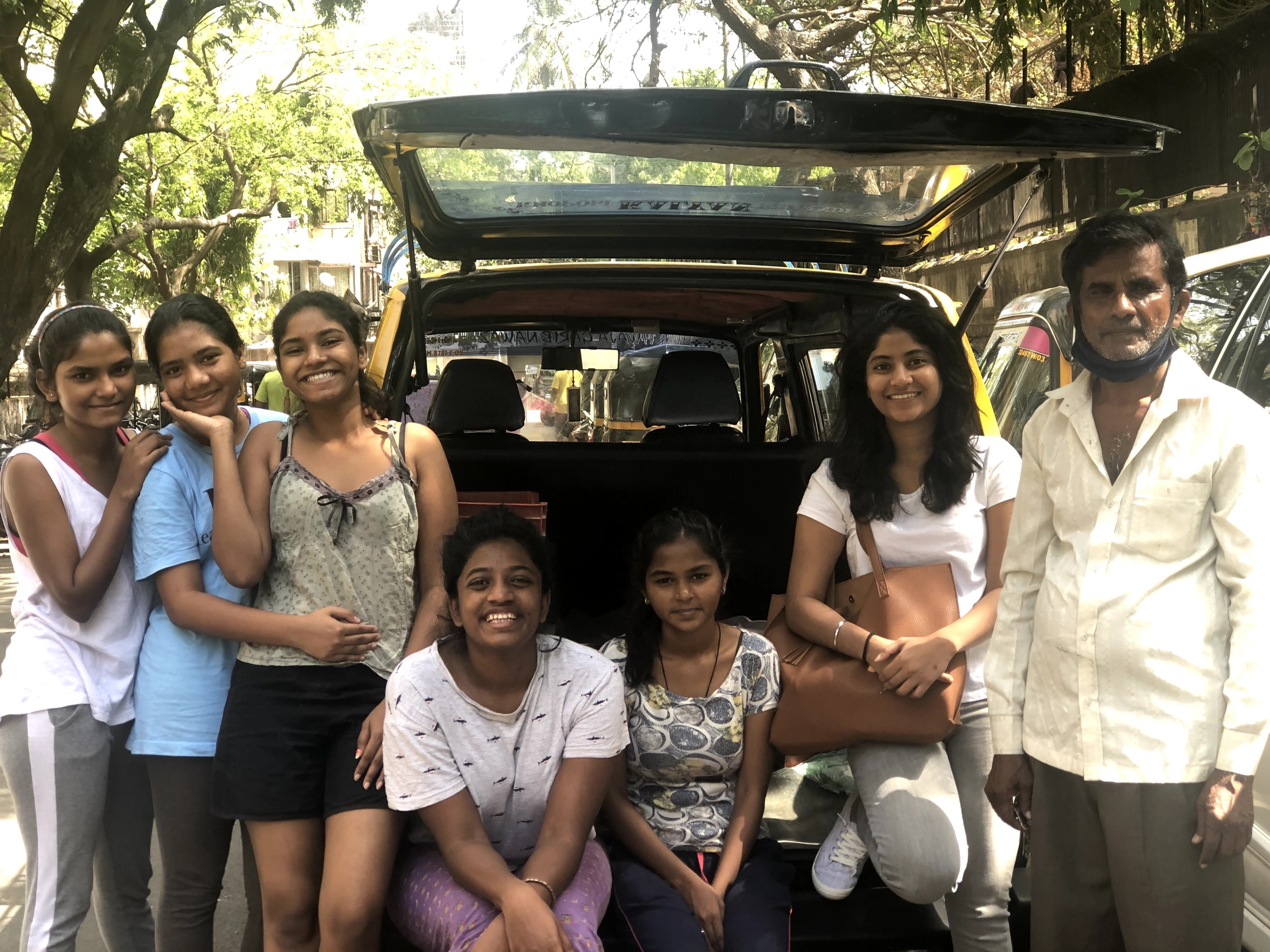 Sandhya Nair (fourth from left) with other krantikaris and the taxi driver who helps them distribute food. Photo: Sandhya Nair
