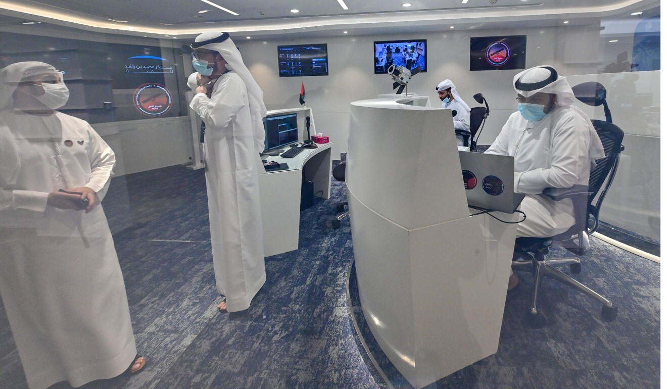 Emirati men at the mission control centre for the Hope Mars probe at the Mohammed bin Rashid Space Centre in Dubai. Photo: AFP
