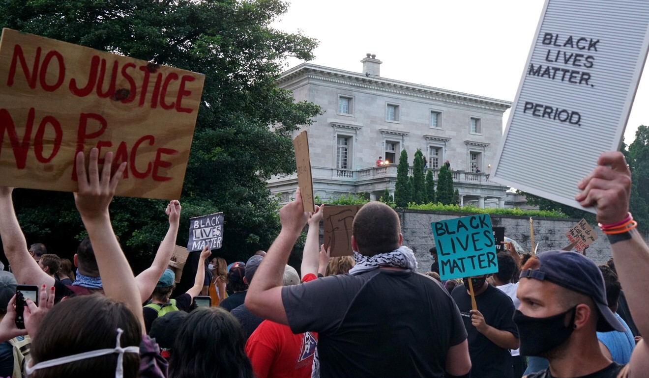 White US couple charged for pulling guns on Black Lives Matter ...