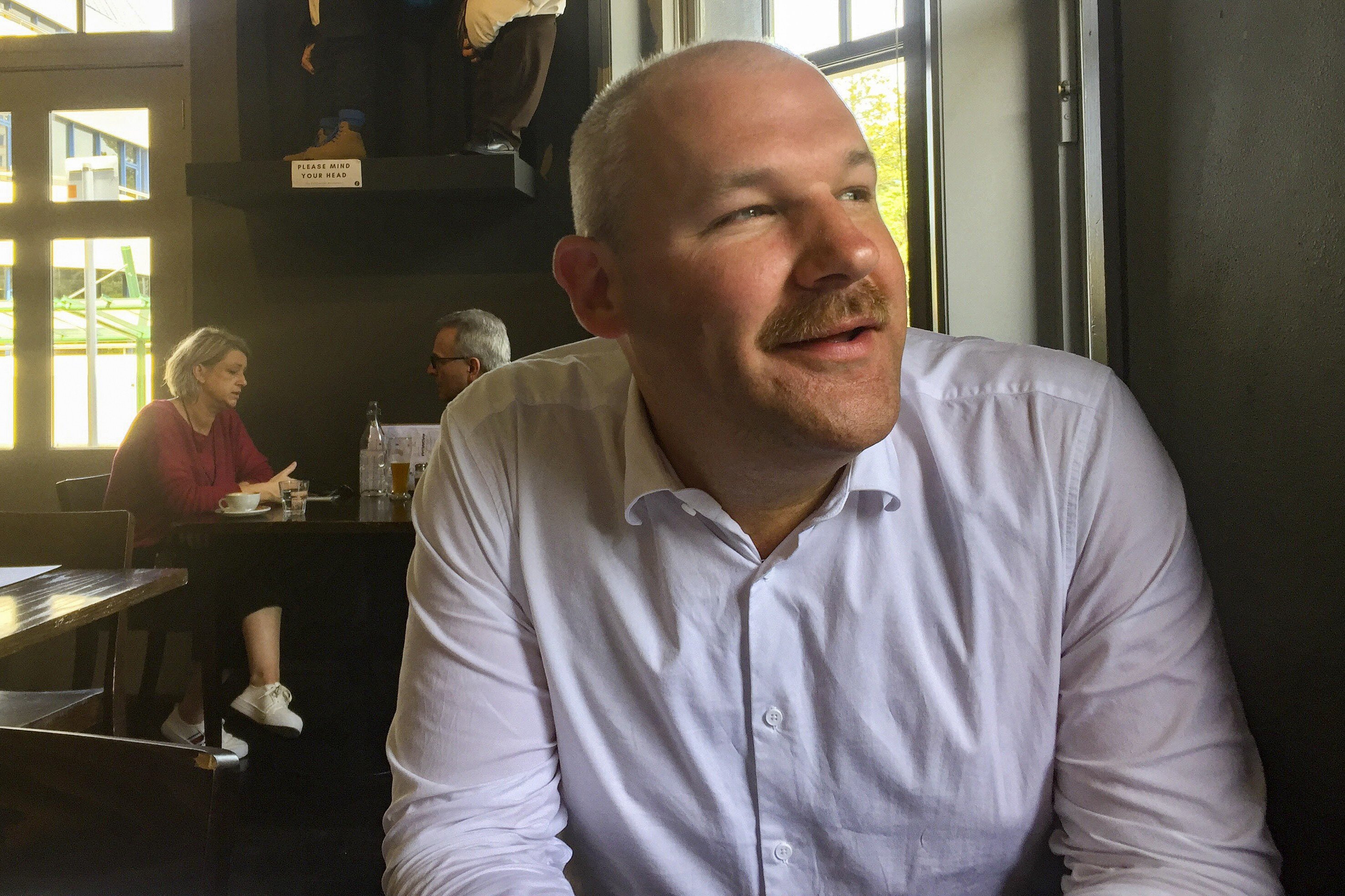 Former National MP Andrew Falloon pictured in a cafe in Wellington, New Zealand, in December. Photo: New Zealand Herald via AP
