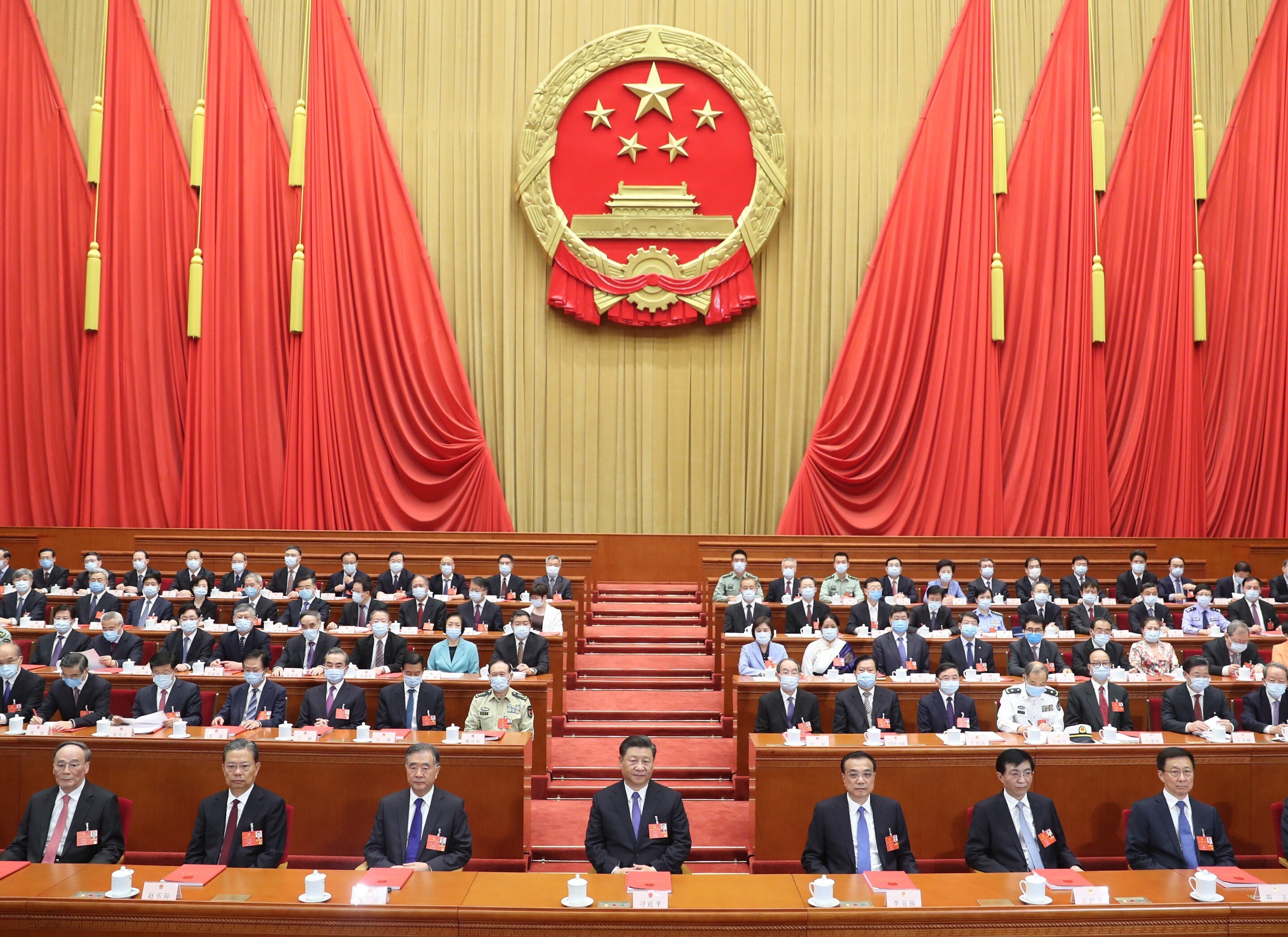 Communist Party leaders hold the closing meeting of the third session of the 13th National People’s Congress, at the Great Hall of the People in Beijing on May 28. Attempts to drive a wedge between the Communist Party and the Chinese people are doomed to failure because the Communist Party is the Chinese people. Photo: Xinhua