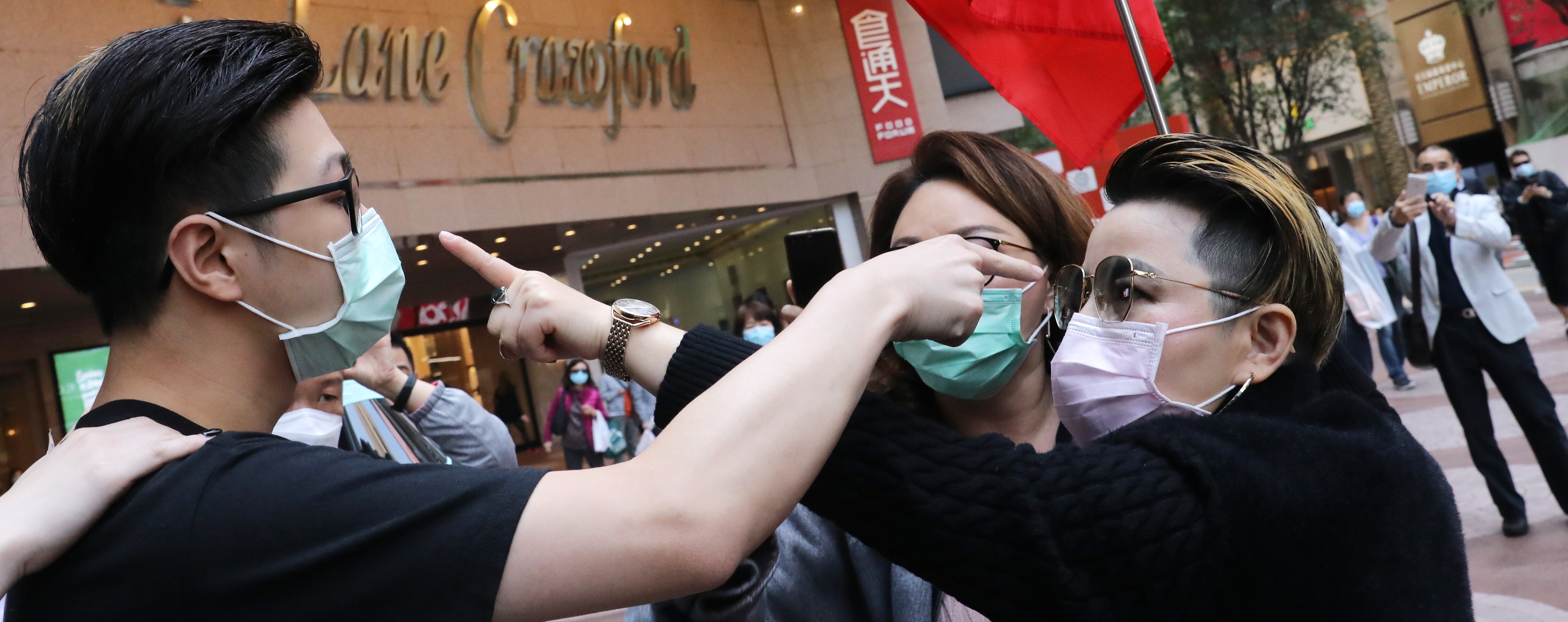 Pro-Beijing supporters clash with anti-government protesters at Times Square in Causeway Bay on February 20. The extradition bill protests, national security law, inequality, a perceived lack of opportunity and more have left Hong Kong society sharply divided. Photo: Dickson Lee