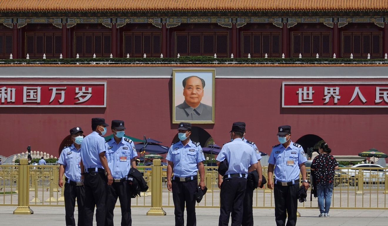 Police officers in Tiananmen Square in Beijing. Photo: Reuters