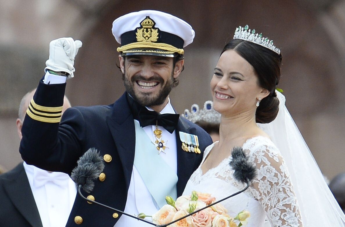 Sweden's Princess Sofia and Prince Carl Philip greet the crowds after their wedding ceremony at Stockholm Palace. Photo: AFP