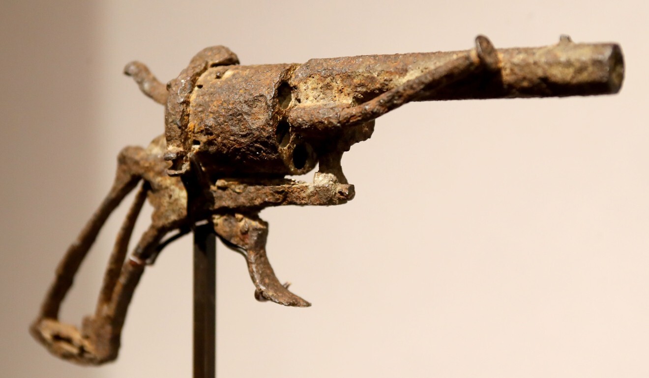 A revolver believed to be the gun Vincent van Gogh used to kill himself is put on public display at the Drouot auction house in Paris in June 2019. Photo: AFP