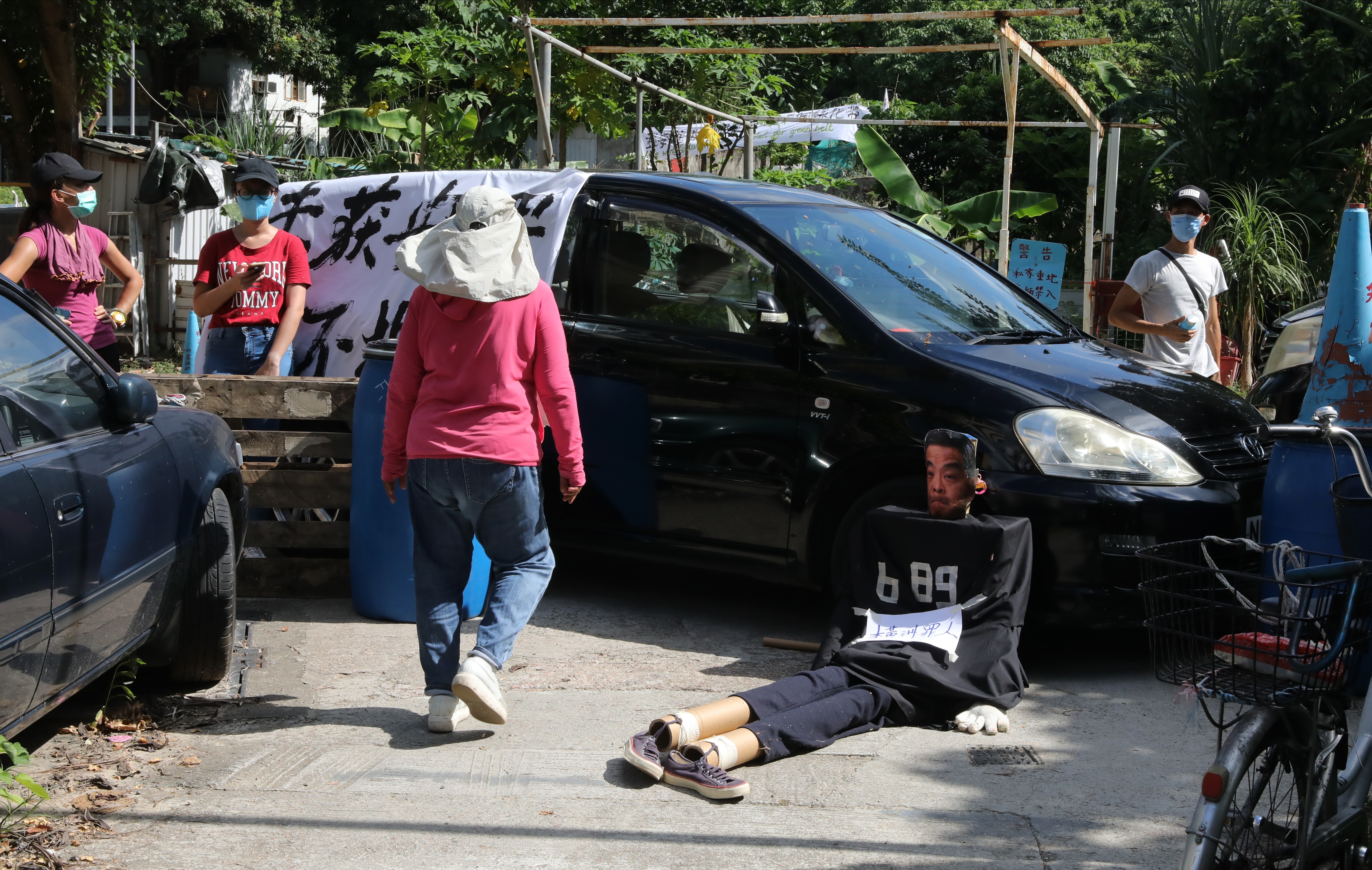 Villagers protesting against the eviction from their homes in Wang Chau. Photo: K. Y. Cheng