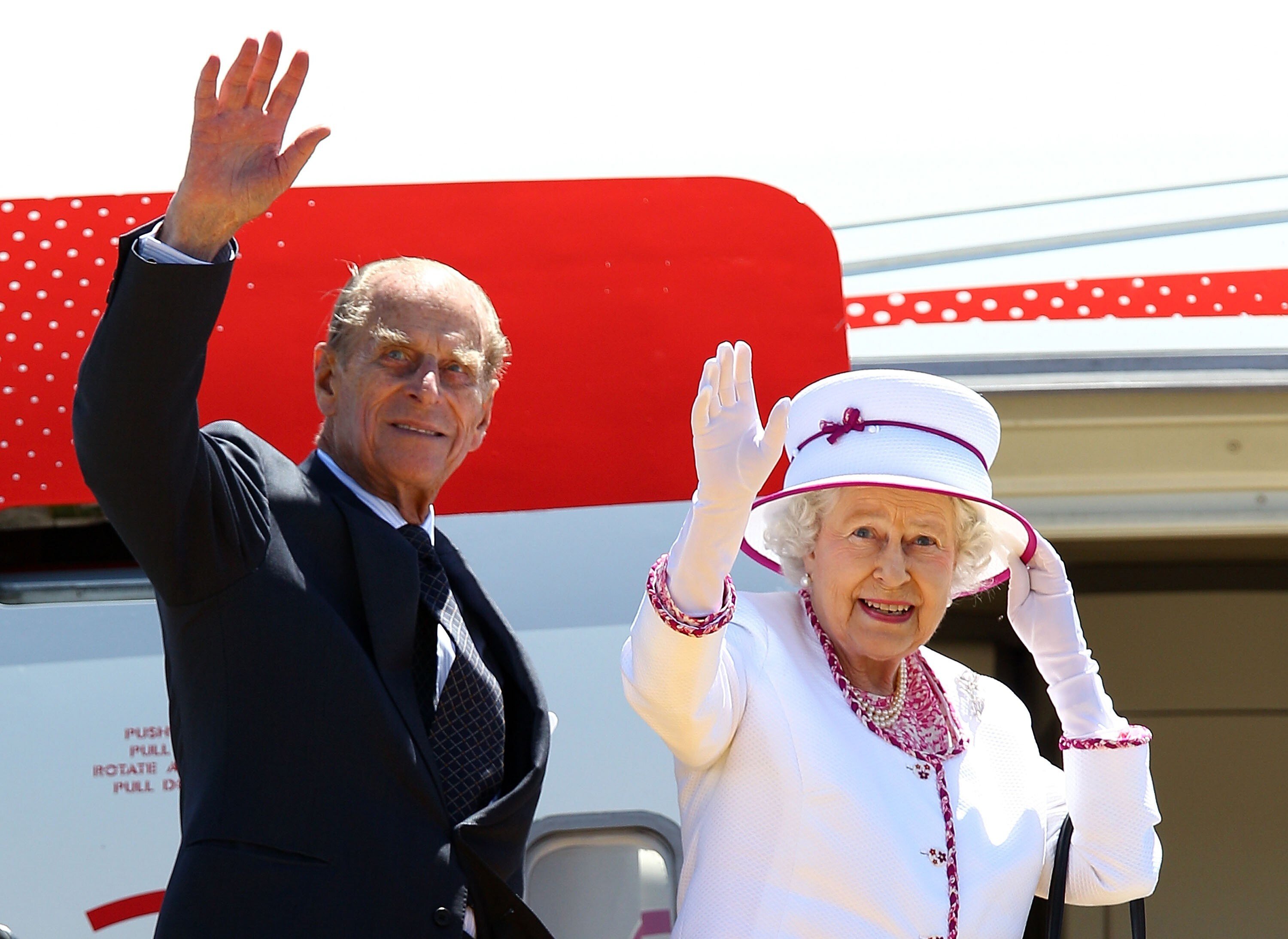 Queen Elizabeth and Prince Philip wave farewell to Australia at Perth International Airport in October 2011, one of her last major international trips. Photo: AFP