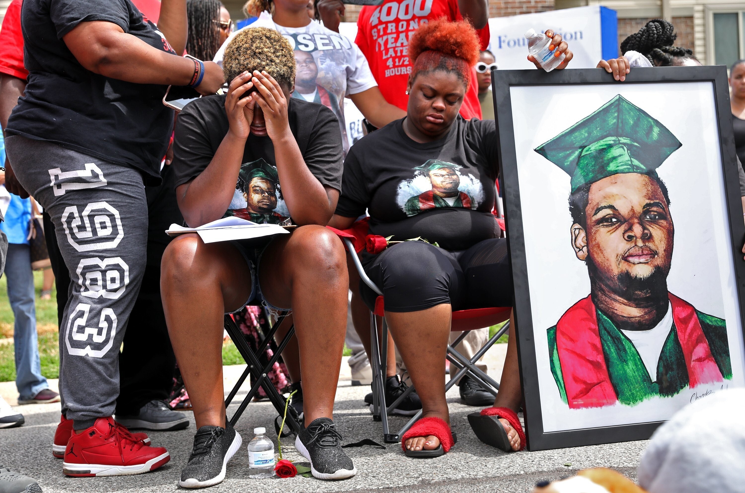 Trinetta Brown (centre left) and Triniya Brown attend a memorial service for their brother, Michael Brown, in Ferguson, Missouri, in August 2018. Photo: St Louis Post-Dispatch via AP