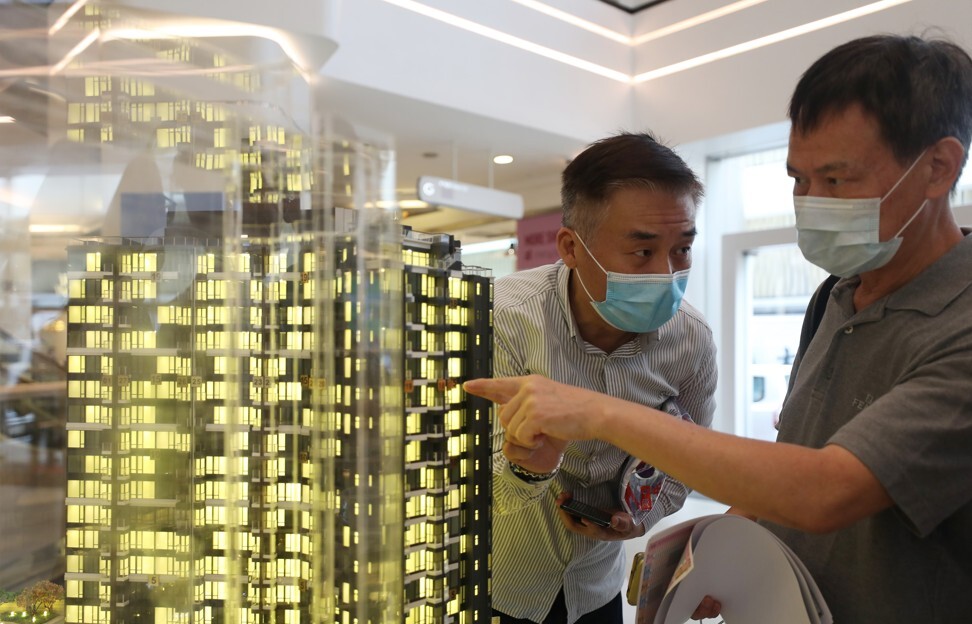 Potential home buyers line up at the sales office in Mira Place One in Tsim Sha Tsui for 185 flats of Seacoast Royale on sales on 1 August 2020. Photo: Xiaomei Chen