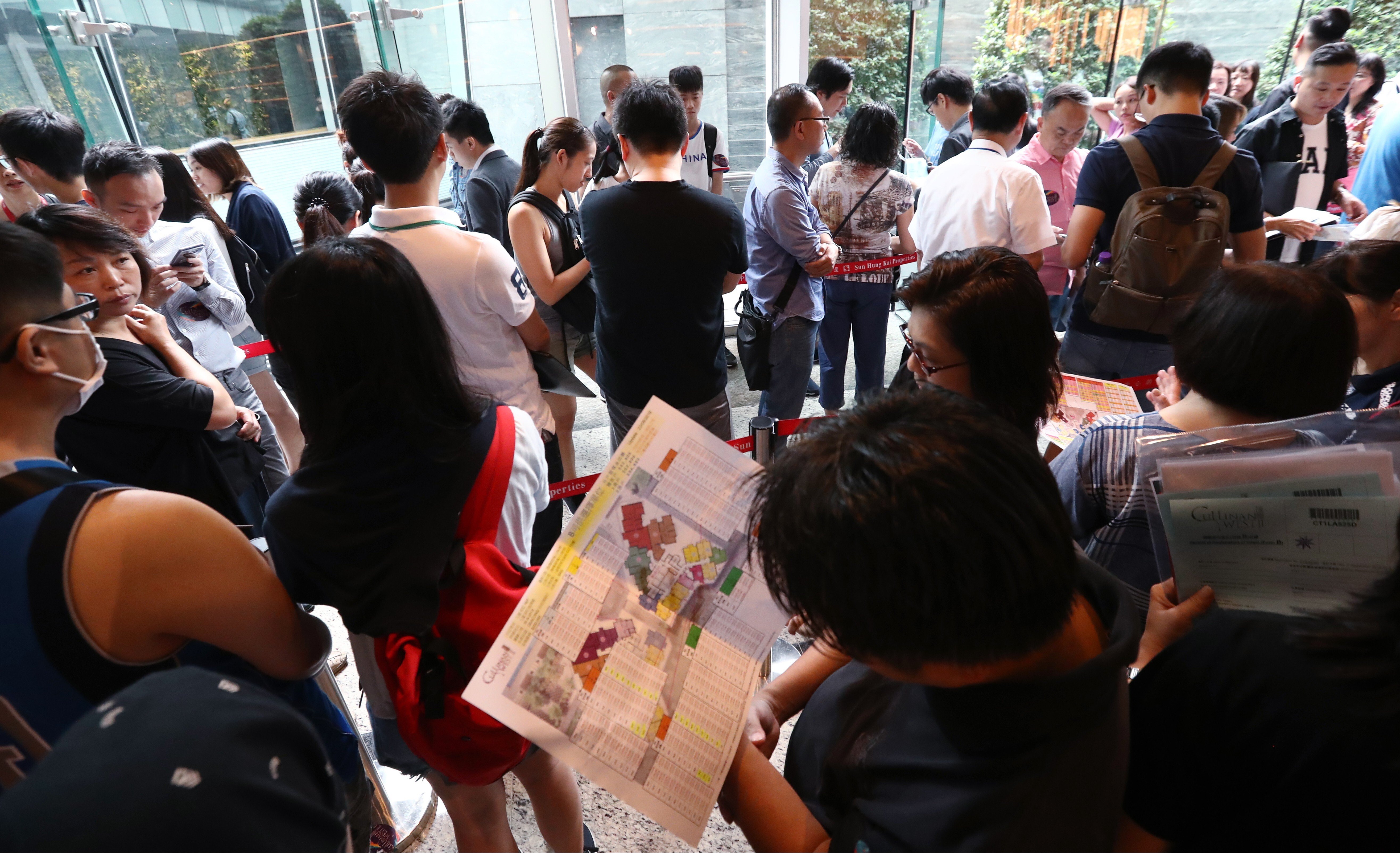 Potential buyers are starting to return to property launches in recent weeks, defying concerns about the third wave of coronavirus pandemic in Hong Kong. Photo: Nora Tam