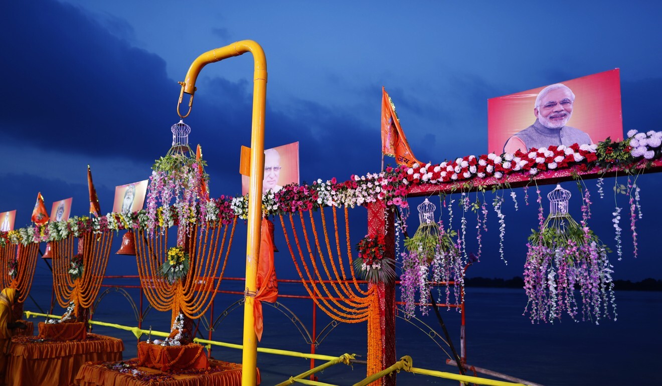 A photo of Indian Prime Minister Narendra Modi on the decorated ghats of the Saryu river in Ayodhya ahead of the groundbreaking ceremony. Photo: AP