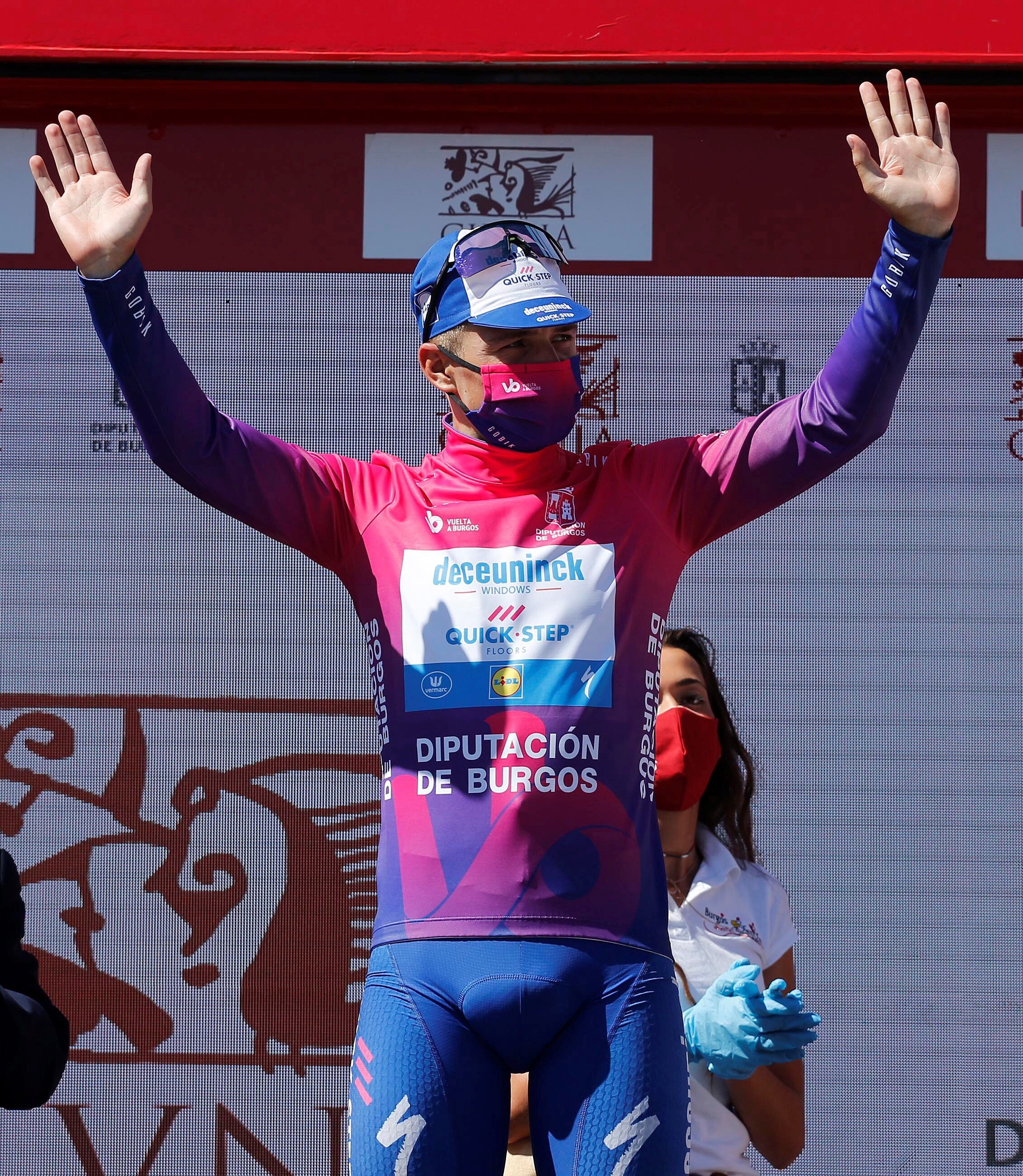 Belgian cyclist Remco Evenepoel celebrates on the podium of the Vuelta a Burgos, Spain. Will masks be the norm at the Tour de France. Photo: EPA
