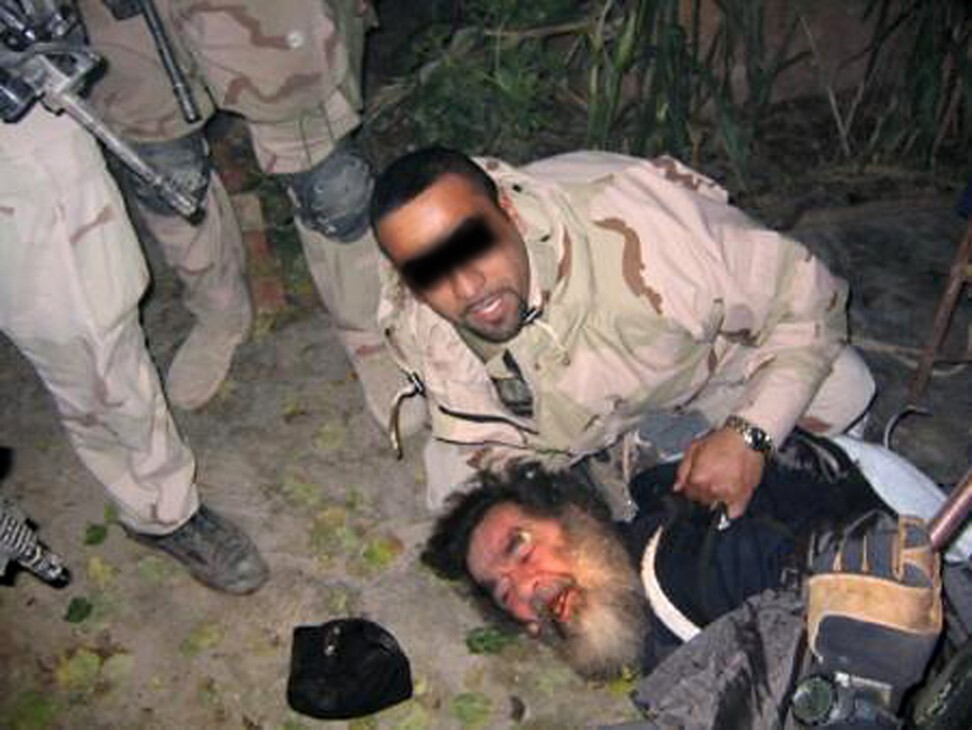 Iraqi leader Saddam Hussein is found in an underground hole by US troops at a farm in the village of ad-Dawr, near his hometown of Tikrit in northern Iraq in December, 2003. Photo: AFP