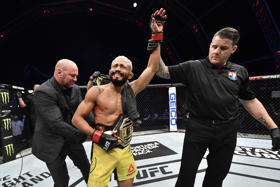 Deiveson Figueiredo celebrates after defeating Joseph Benavidez to win the vacant UFC flyweight title. Photo: Jeff Bottari/Zuffa LLC via Getty Images