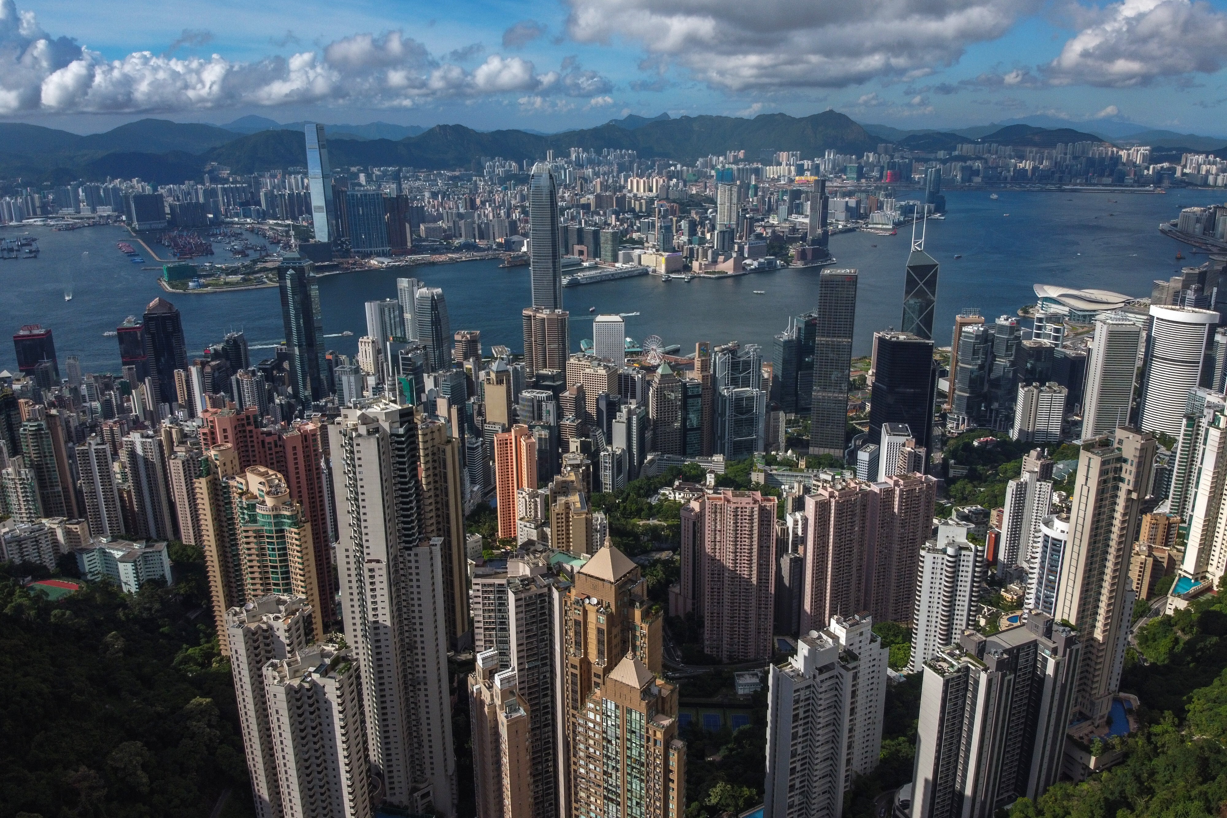 The view of Hong Kong's skyline from Victoria Peak on July 17. The city’s finance sector can go some way towards lifting the overall economy, but the government must invest in other productive sectors as it cannot do so on its own. Photo: Sun Yeung