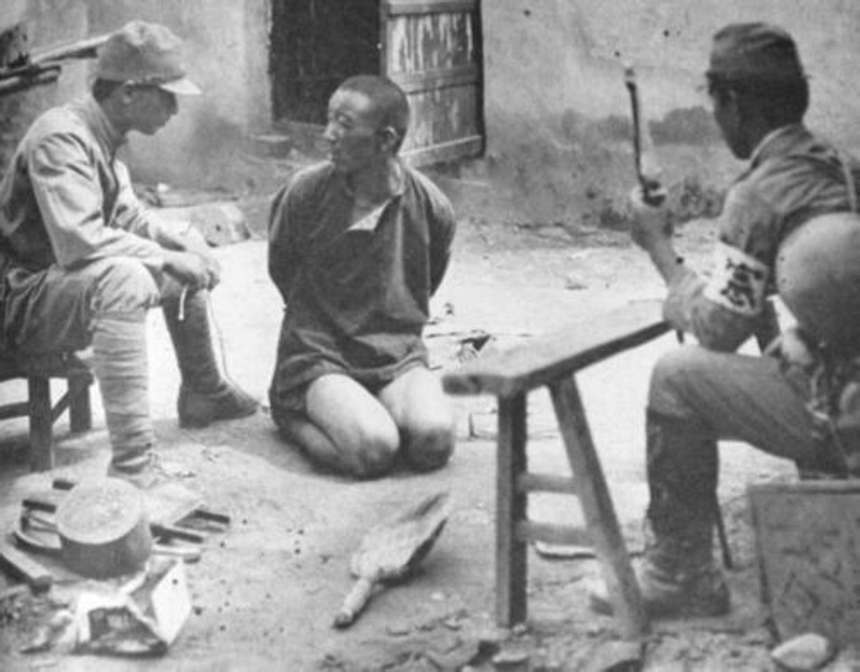 Kempeitai officers interrogate a prisoner. Photo: Handout